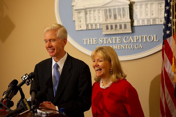 Governor Davis and First Lady Sharon Davis Share a Laugh With Reporters Prior to the Unveiling of His Official Portrait.