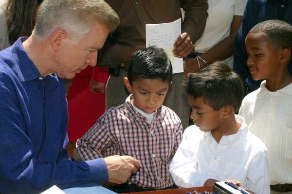 Governor Davis with kids at a Southern California Earth Day Event.