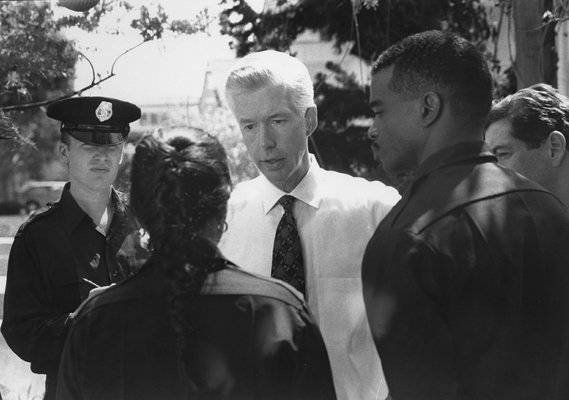 Governor Gray Davis Speaking with law enforcement officers following a Town Hall meeting.