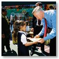 Governor Davis Greets a Young Girl Following a Southern California School Event to Highlight Improving Academic Scores.
