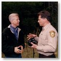 Governor Gray Davis talking with a State Park ranger about environmental issues.  